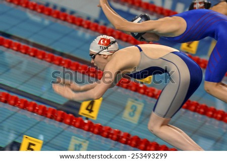 EINDHOVEN, HOLLAND-MARCH 21, 2008: female swimmers on starting blocks during the European Swimming Championship, in Eindhoven.
