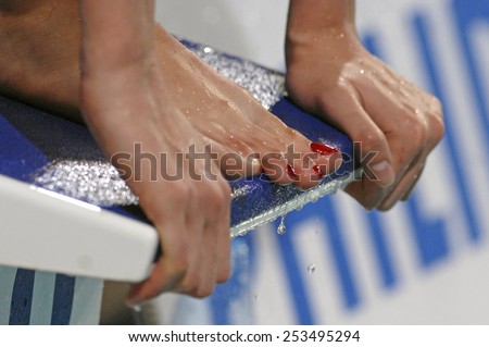 EINDHOVEN, HOLLAND-MARCH 23, 2008: close up of female diver standing on diving board during the European Swimming Championship, in Eindhoven.