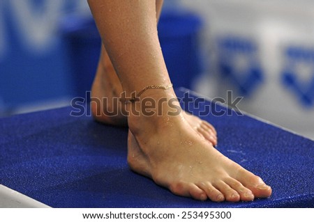 EINDHOVEN, HOLLAND-MARCH 20, 2008: close up of female diver feet standing on diving board during the European Swimming Championship, in Eindhoven.