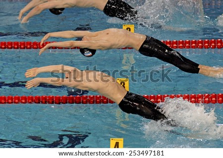 EINDHOVEN, HOLLAND-MARCH 22, 2008: male divers at starting blocks during the European Swimming Championship, in Eindhoven.