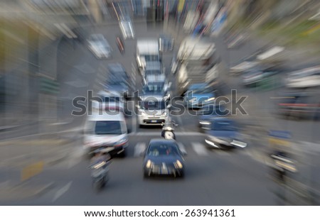 MILAN, ITALY-MARCH 23, 2015: blurry car traffic vision in Melchiorre Gioia street, in Milan.