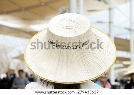 MILAN, ITALY-MAY 04, 2015: steward wearing tradition hat outside the Thailand pavillon of the EXPO 2015. Food is the main topic of this Italian edition, in Milan.