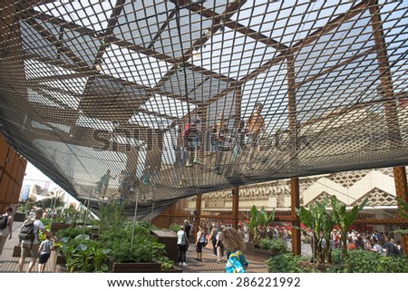 MILAN, ITALY-JUNE 05, 2015: the Brazil pavillion with the elastic rubber pavement and tropical plants at EXPO 2015, in Milan.