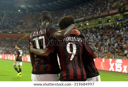 MILAN, ITALY-AUGUST 29, 2015: AC Milan soccer players celebrating after scoring during the Italian serie a soccer match AC Milan vs Empoli at the San Siro stadium, in Milan.