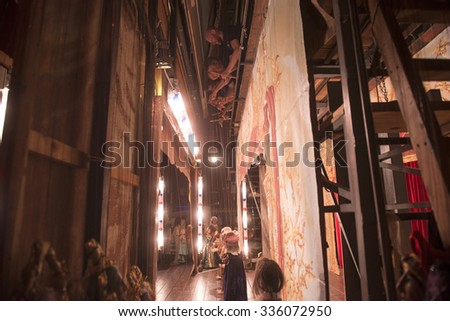 MILAN, ITALY-FEBRUARY 26, 2015: backstage manual handling marionettes during the Sleeping beauty show of the Carlo Colla Company, in Milan.