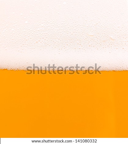 Light beer background. Half background froth. Half background beer.