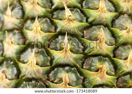 Pineapple fruit close up. Texture. Whole background.