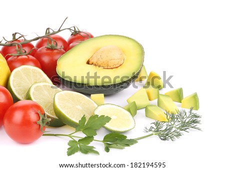 Avocado with vegetables and citrus. Isolated on a white background.