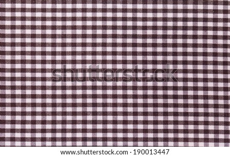 Textile texture in  black cell. Whole background.