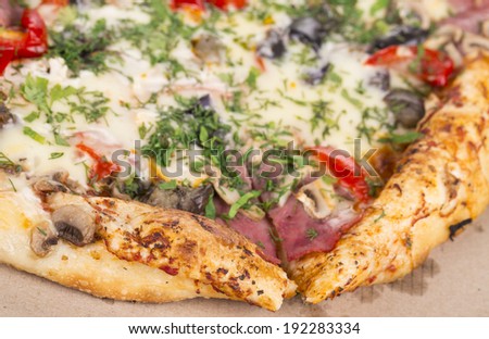 Close up of tasty pizza in box. Whole background.