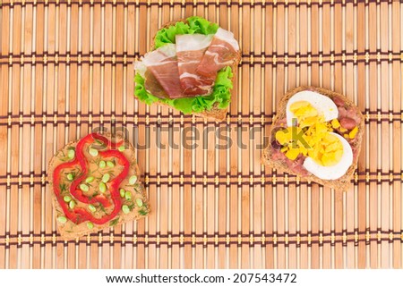 Toast composition with pepper and egg. Whole background.