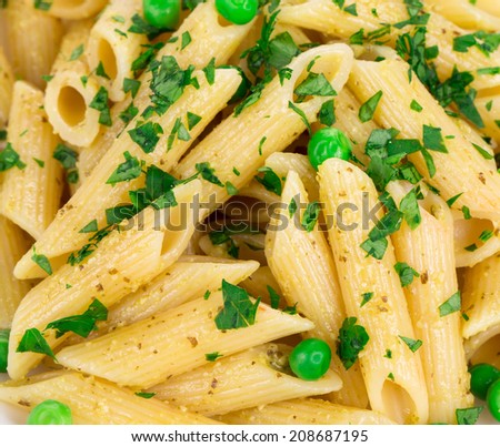 Tasty italian pasta with peas. Whole background.