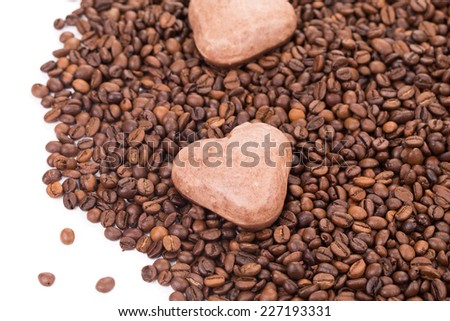 Cookies on coffee beans with macarons. Whole background.