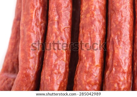 Tasty smoked beef sausages. Macro. Photo can be used as a whole background.