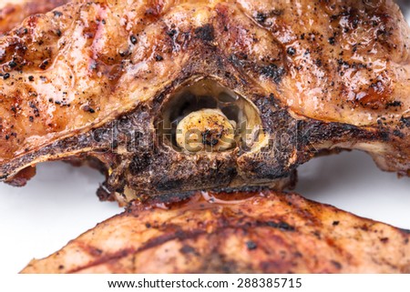 Delicious grilled lamb meat fillet. Macro. Photo can be used as a whole background.