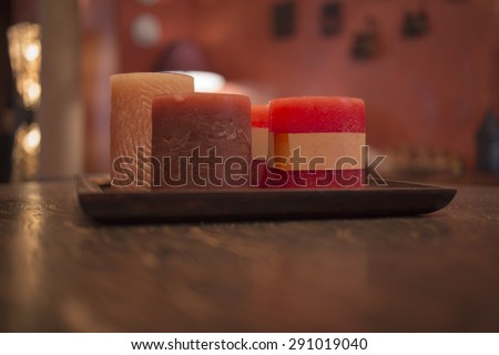 Candles in the interior. candles on a tray in red interior.