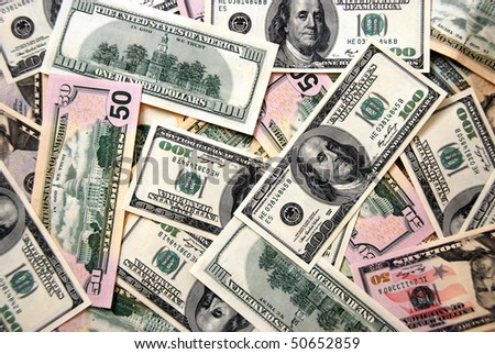 Money background of $100 and $50 bills in USA currency