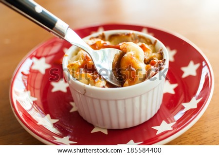 Macaroni and cheese in a small bowl for eating alone