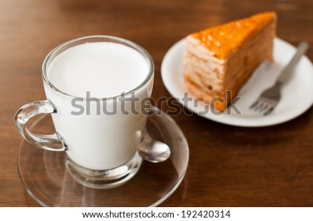 Glass of rich creamy cows milk for a healthy refreshment in a tumbler
