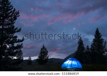 Camping under a summer night sky