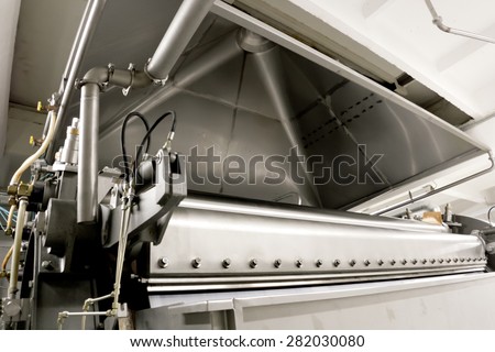 Exhaust hood over the drum dryer