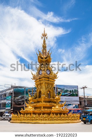 CHIANGRAI, THAILAND - MAY 12 : Golden clock tower,Not have any effect. After the 6.3 magnitude earthquake.established in 2008 by Thai visual artist Chalermchai Kositpipatat May 12, 2014 in Chiang Rai,Thailand.