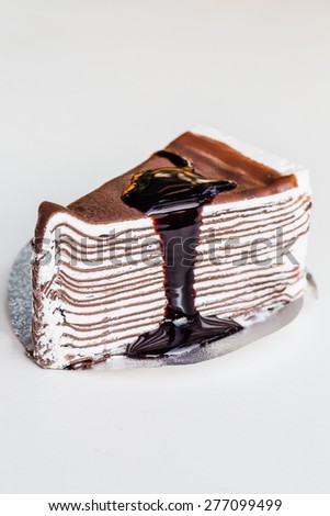 chocolate crepe cake on white background