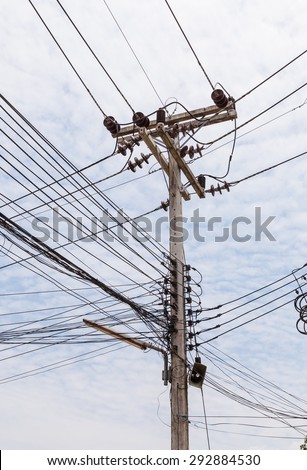 Distribution transformer box and electricity line on concrete pole