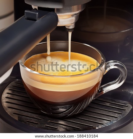 coffee machine and cup of coffee