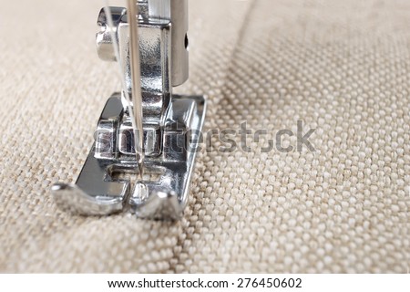 sewing machine makes a seam on fabric. sewing process
