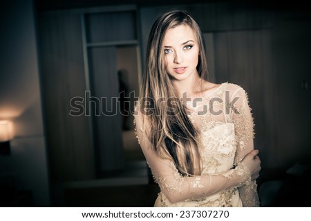 Beauty portrait of a beautiful spa woman in hotel room. Perfect fresh skin. Pure beauty model girl. Youth and skin care concept. Gorgeous bride to be before the wedding