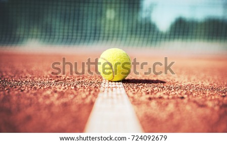 Tennis game. Tennis ball on the tennis court. Sport, recreation concept