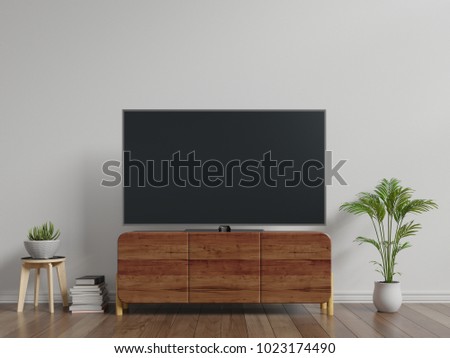 Smart TV on cabinet  the white wall in living room,minimal design,3d rendering