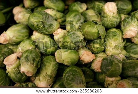 Brussel Sprouts at a produce stand.