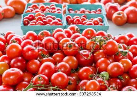 Tomatoes at a produce stand.