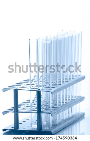 Set of empty test lab tubes on stand