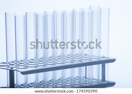 Set of empty test lab tubes on stand