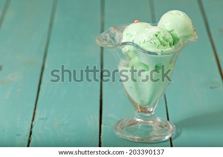Mint ice cream on wooden boards