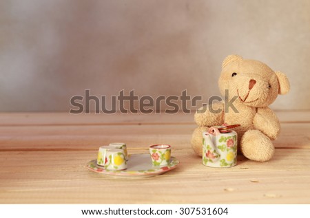 Teddy bear and mini tea set