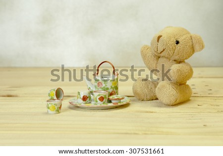 Teddy bear and mini tea set