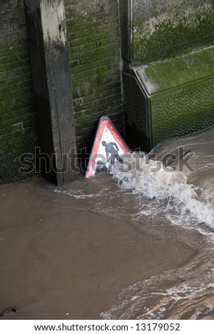 flooded public works sign in the coast