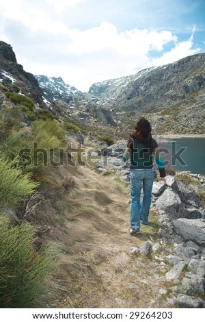 woman walking at gredos mountains in avila spain