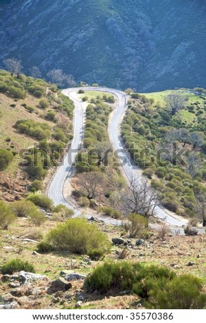 rural road curve at valley of jerte in caceres spain