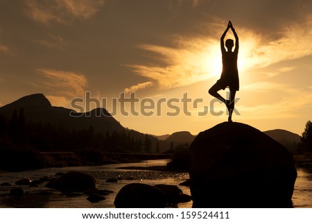 Silhouette of Outdoor Yoga, Young Woman in Tree Pose