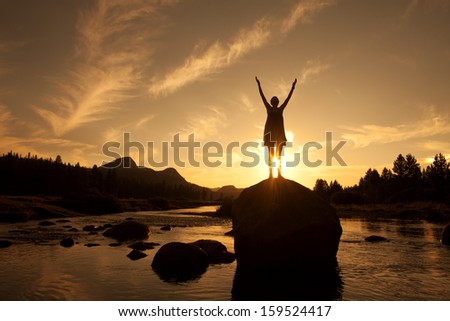 Silhouette of Outdoor Yoga, Young Woman in Sun Salutation