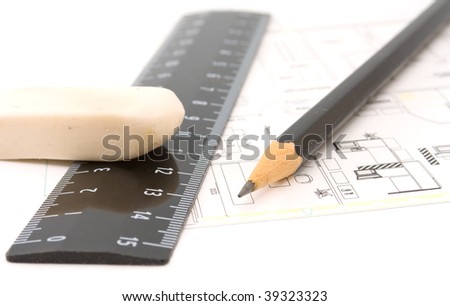 Ruler, eraser and a pencil on the floor plan - Business a still-life