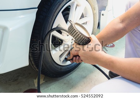 Check tire pressure With tire gauge Standards. The safe travel.