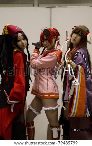 TOKYO - MAY 01: Girls dressed up for Tokyo Dream Party, an Anime and Manga Cosplay on May 01, 2011 at Tokyo Big Sight, Tokyo, Japan. Tokyo Dream Party is the biggest Anime & Manga conventions in Japan