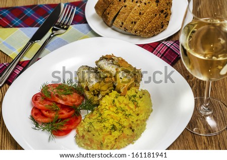 Fish fillet with vegetables and white wine
