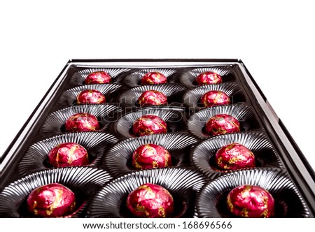 Box of chocolate candies. Closeup.
